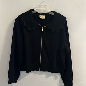 SSYS brand new, not tags black zip up jacket with scalloped collar.